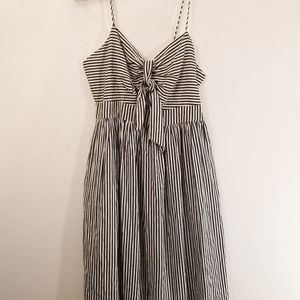 Zara , black and white zip up dress with cut out and tie detail on front